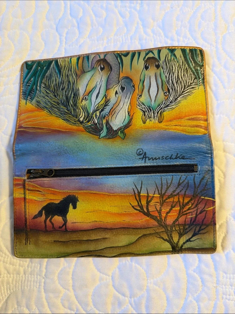 Anuschka hand-painted leather wallet featuring a vibrant 
